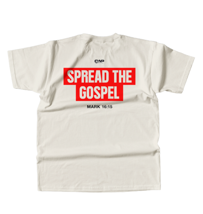 An off-white short-sleeve t-shirt with a bold graphic on the back. The graphic features the words 'SPREAD THE GOSPEL' in white text inside two overlapping red rectangular blocks, with 'MARK 16:15' printed in black below.