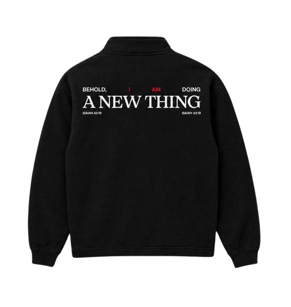Black New Wine quarter-zip sweatshirt featuring the “I Am Doing a New Thing” design.